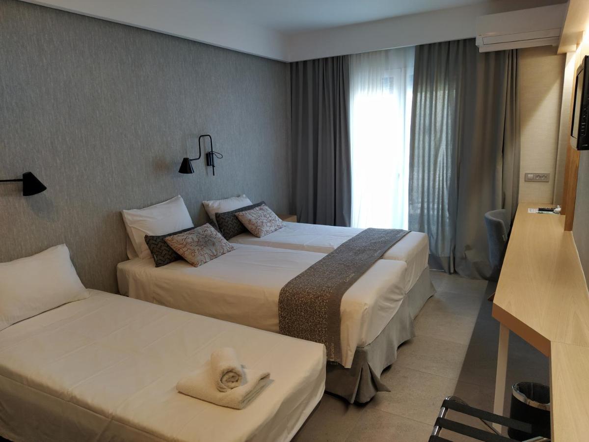 Minoa Hotel Tolón Esterno foto