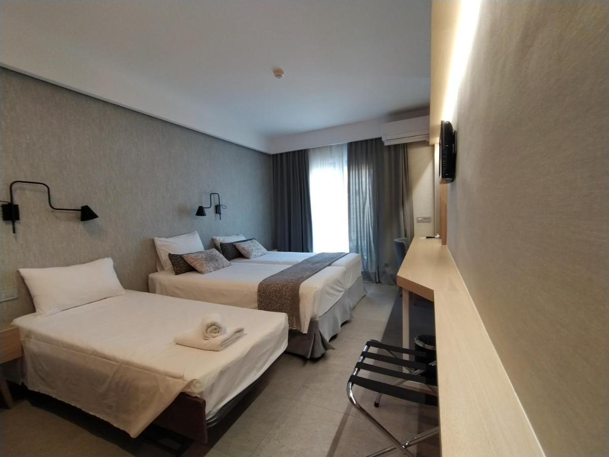 Minoa Hotel Tolón Esterno foto